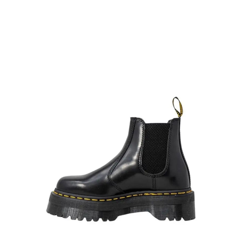 Black leather platform Chelsea boot displayed in a stylish footwear product image