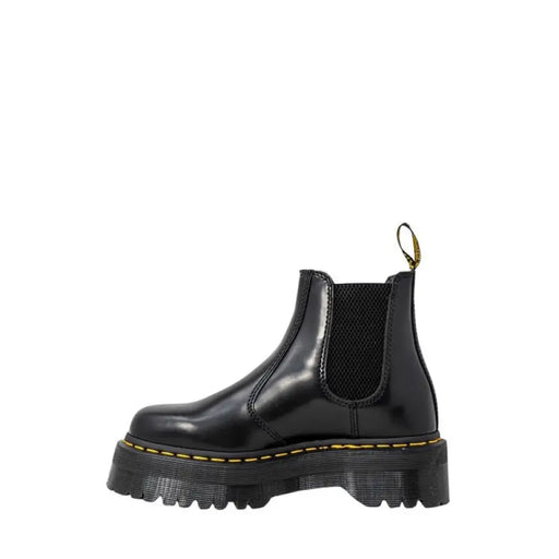 Black leather platform Chelsea boot displayed in a stylish footwear product image