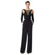 Black lace-up bodysuit with cut-out shoulders and Elisabetta Franchi wide-leg trousers