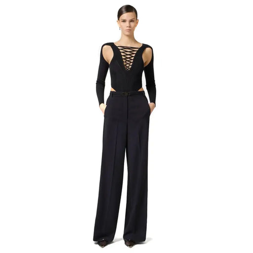 Black lace-up bodysuit with cut-out shoulders and Elisabetta Franchi wide-leg trousers