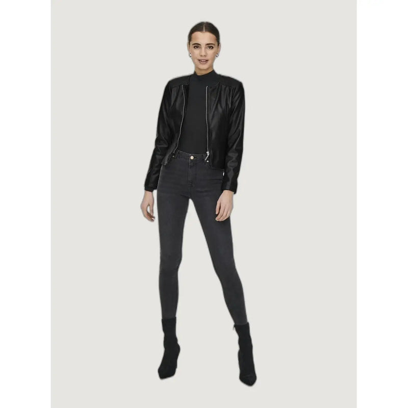 Black polyurethane long blazer for women featuring a high collar, silver zippers, and faux leather bomber jacket style