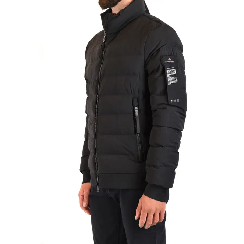 Black puffer jacket featuring quilted design, high collar, and zippered pockets for warmth and functionality