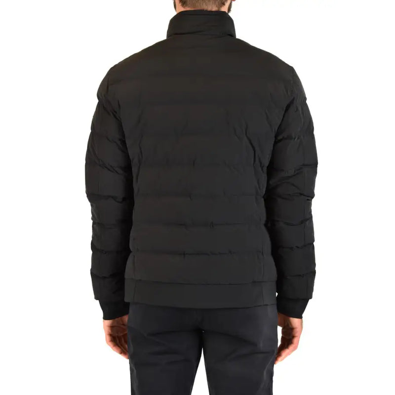 Black puffer jacket with high collar and horizontal stitching designed for warmth and style
