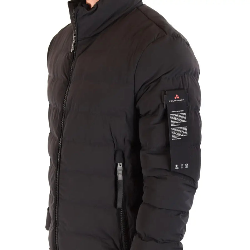 Black puffer jacket with quilted design and high collar made for warmth and style in cold weather