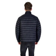Men’s Black Quilted Puffer Jacket displayed in a stylish outdoor setting