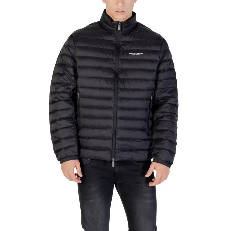 Men’s black quilted puffer jacket displayed on a mannequin for cold weather fashion