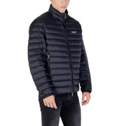 Black quilted puffer jacket for men displayed in a product image