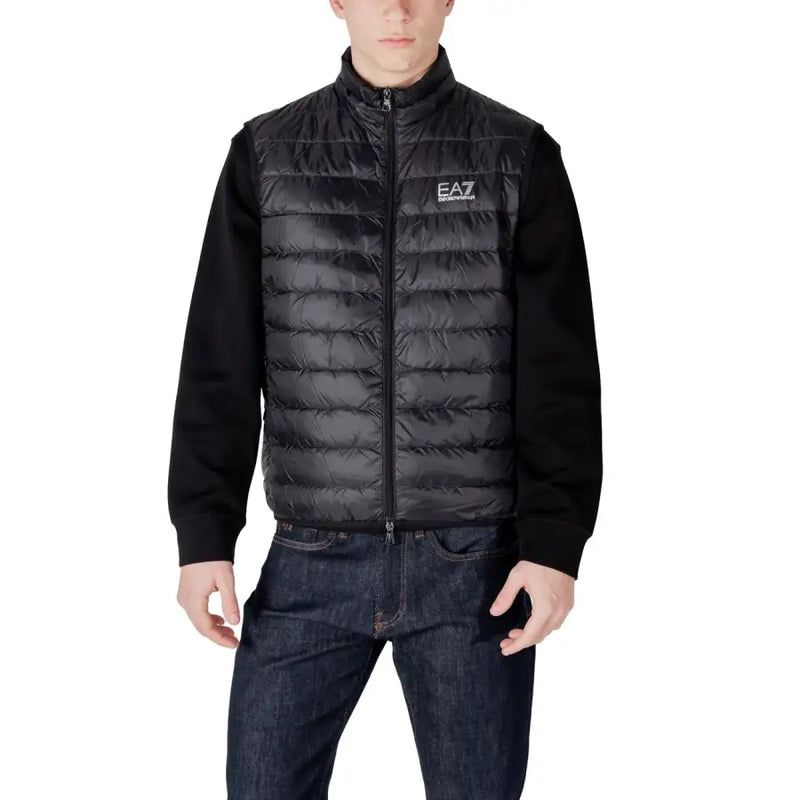 Black quilted puffer vest with knit sleeves zipper front and ea7 logo on the chest
