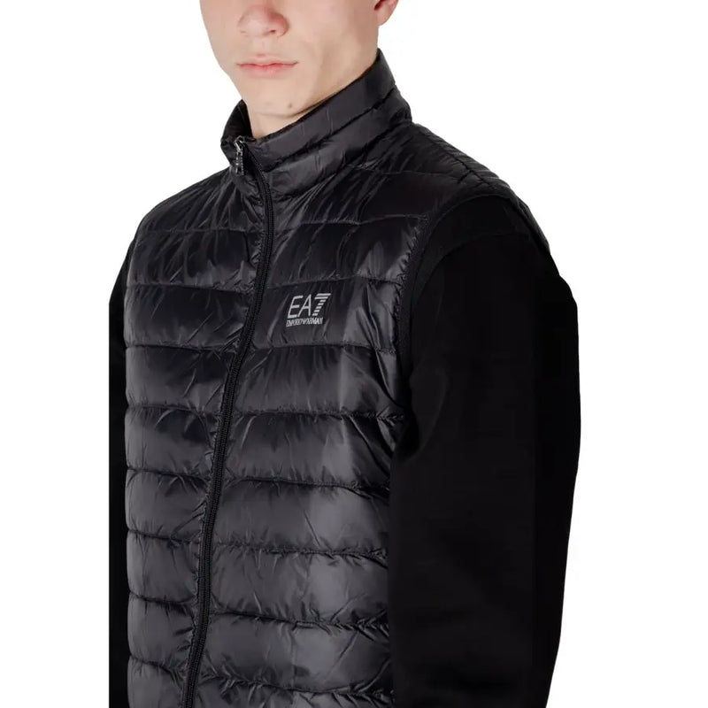Black quilted puffer vest with high collar zipper front and ea7 emporio armani logo patch on chest