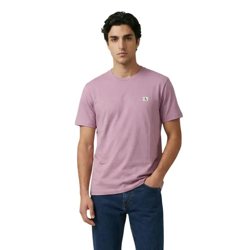 Black short sleeve crewneck t-shirt featuring a soft lavender Calvin Klein fabric with subtle chest embroidery