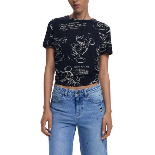 Black cotton crop top with Mickey Mouse sketch patterns and text, ideal for women
