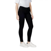 Black skinny jeans featuring a sleek, form-fitting design with high-waisted cut in a classic black color