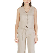 Women’s beige linen vest and wide-leg trousers set styled with the Black Sleeveless Linen Viscose V Neck Gilet with Front Pockets