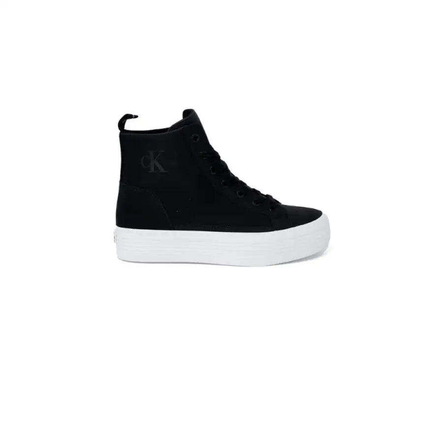 Calvin Klein Jeans women’s black sneaker with white soles, stylish and modern