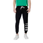 Black sweatpants with white drawstring featuring vertical icon lettering on the left leg made from soft fabric