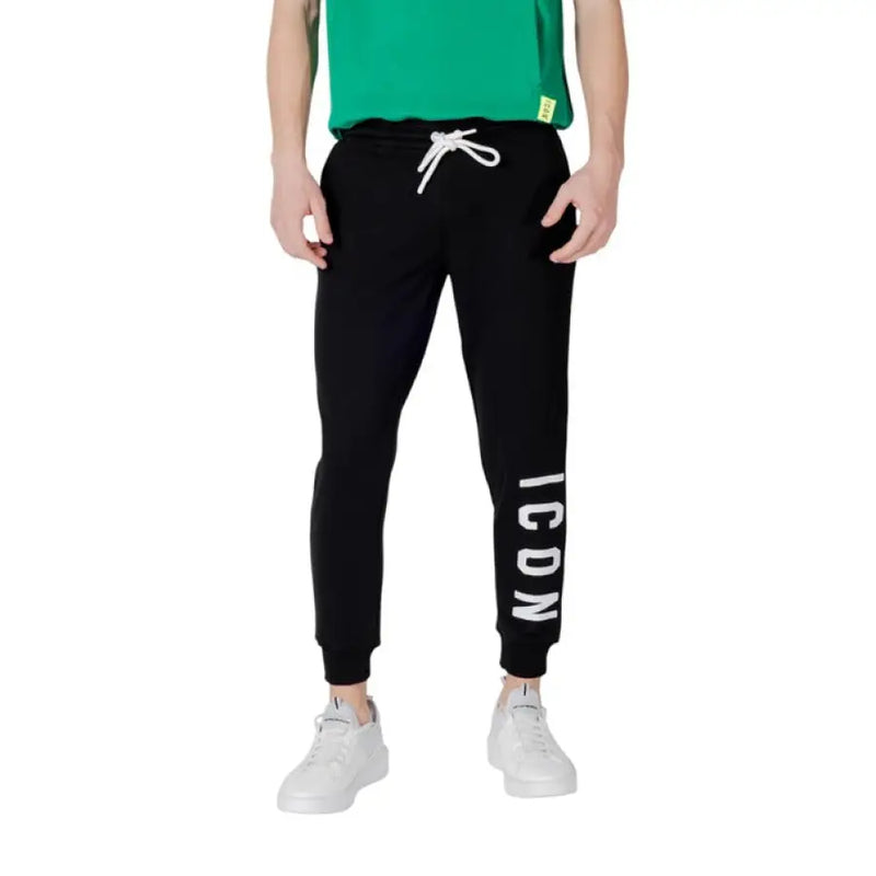 Black sweatpants with white drawstring and ICON print for casual comfort