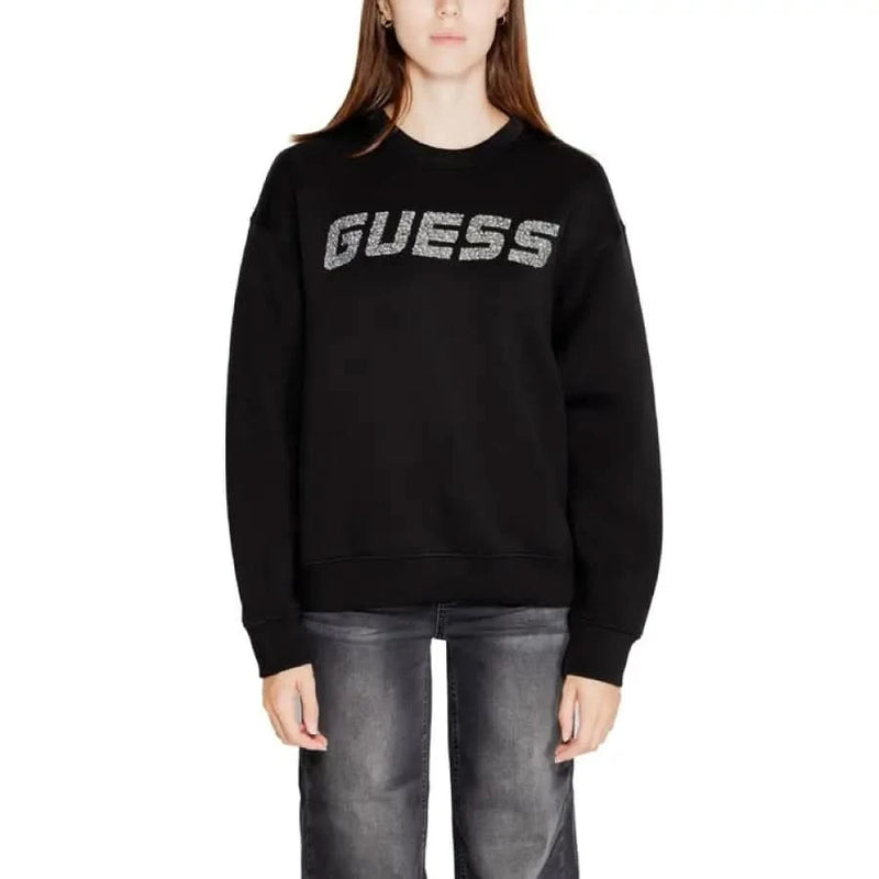 Black sweatshirt featuring sparkly silver GUESS logo across the chest for women