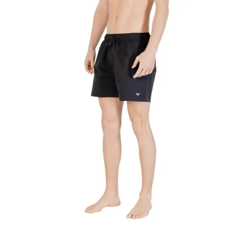 Black swim trunks displayed on a product page, suitable for swimming or beachwear