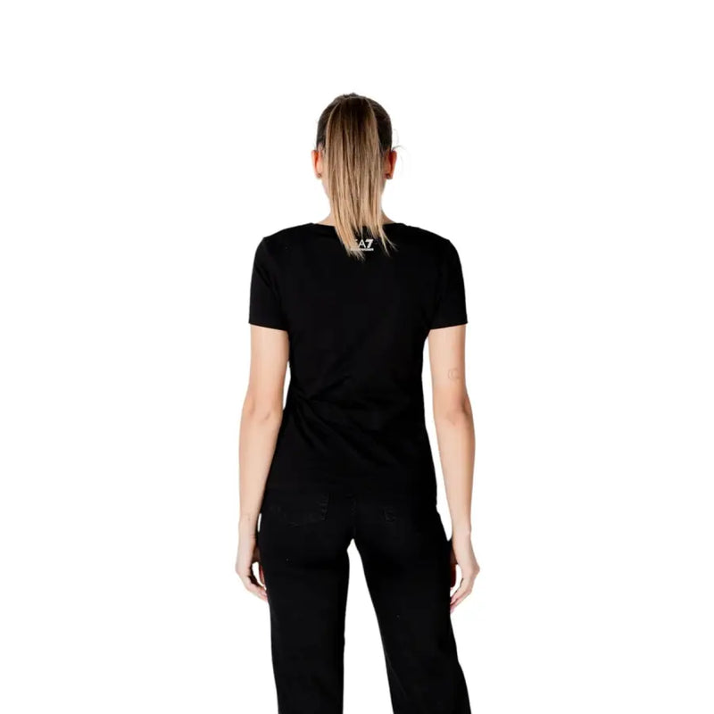 Black short-sleeved t shirt with a subtle white logo at the neckline featuring a graphic design