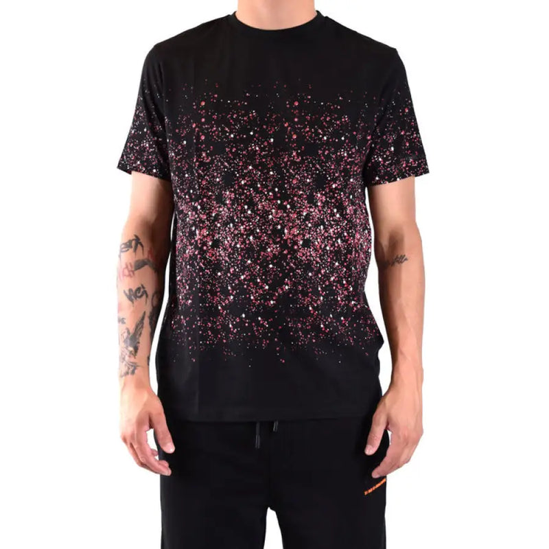 Black T shirt featuring pink splatter pattern for a modern and stylish look