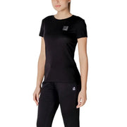 Black crewneck T shirt paired with matching sweatpants in a stylish casual set