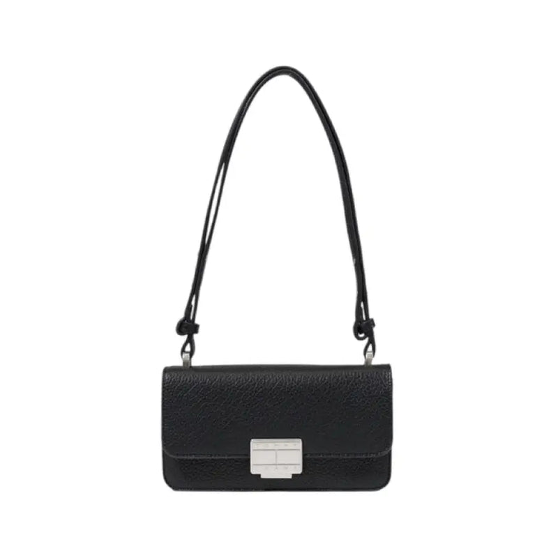Black textured leather shoulder bag displayed for stylish and durable accessory