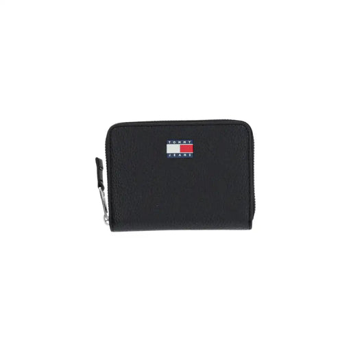 Black Tommy Jeans wallet with zipper detail displayed in the product listing