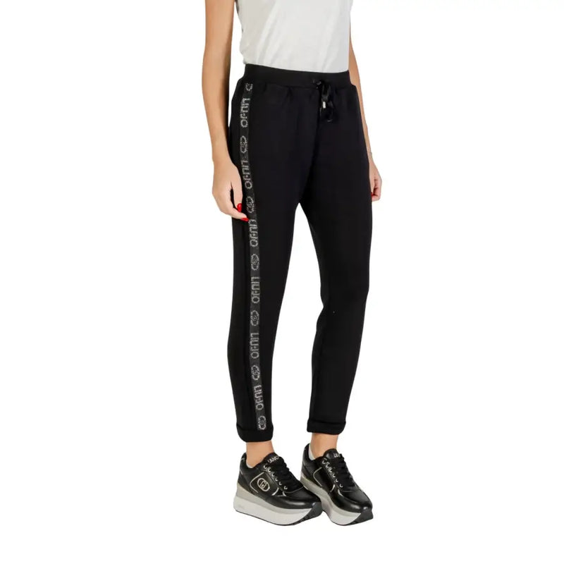 Black track pants with a logo side stripe from Liu Jo Women Trousers in Black Print with Lace Details