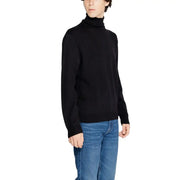 Black turtleneck sweater by Armani Exchange with ribbed cuffs and hem, made from soft knit fabric