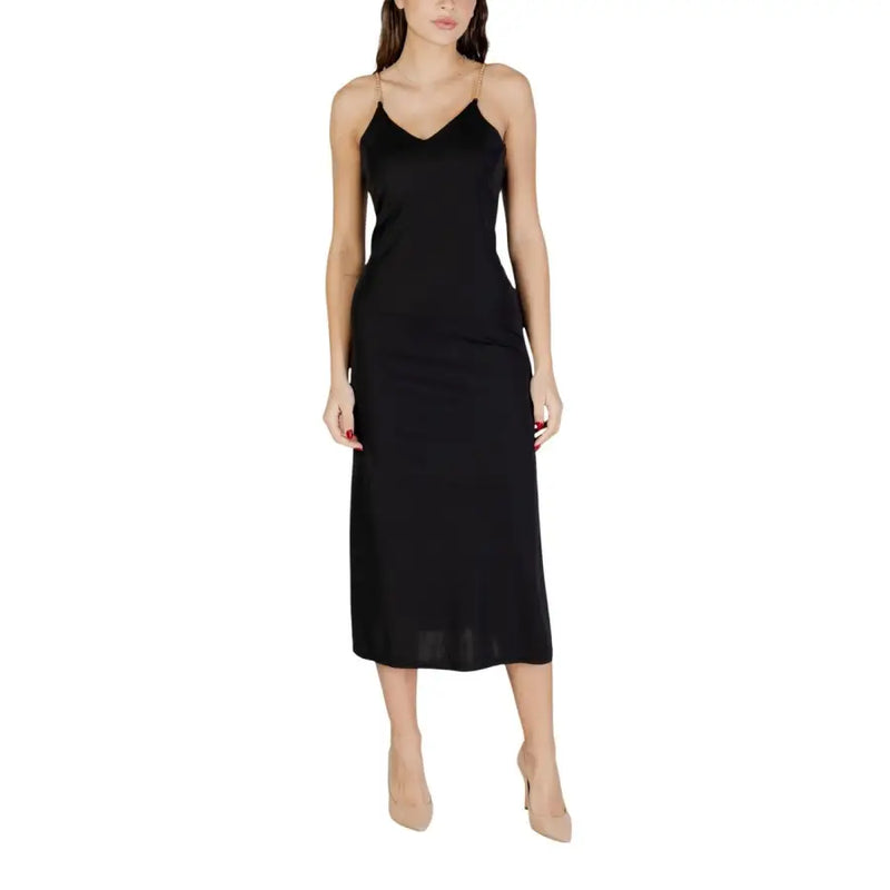 Black v-neck strappy satin slip dress by Morgan De Toi with thin spaghetti straps and elegant silhouette