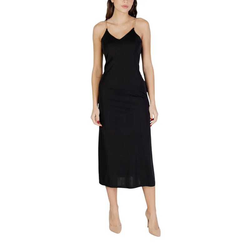 Black v-neck strappy satin slip dress by Morgan De Toi with thin spaghetti straps and elegant silhouette