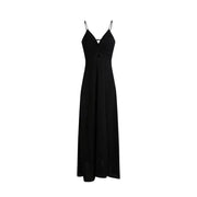 Black v neck strappy maxi dress by Morgan De Toi with a center front knot detail and spaghetti straps