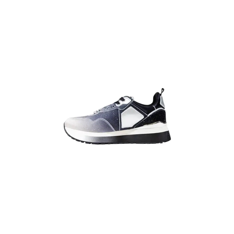 Black, white, and gray synthetic slip-on sneaker with rhinestones and a thick sole