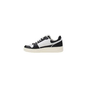 Black and white low-top sneaker from Tommy Hilfiger displayed in a product image