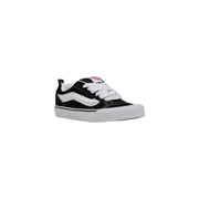 Black and white Vans leather sneakers with white laces for women in fall winter collection