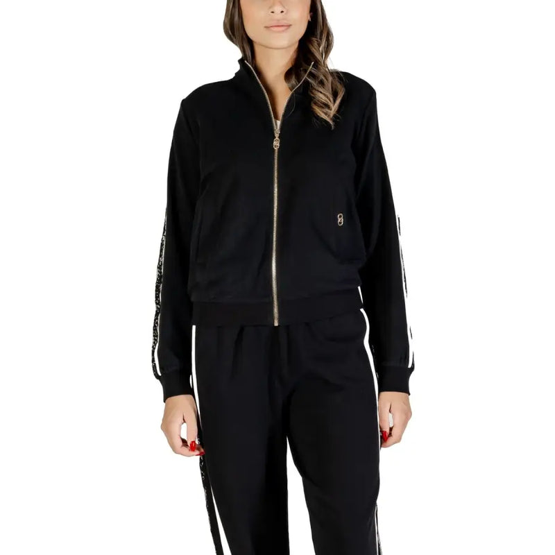 Black women’s tracksuit with white side stripes and gold zipper from Liu Jo