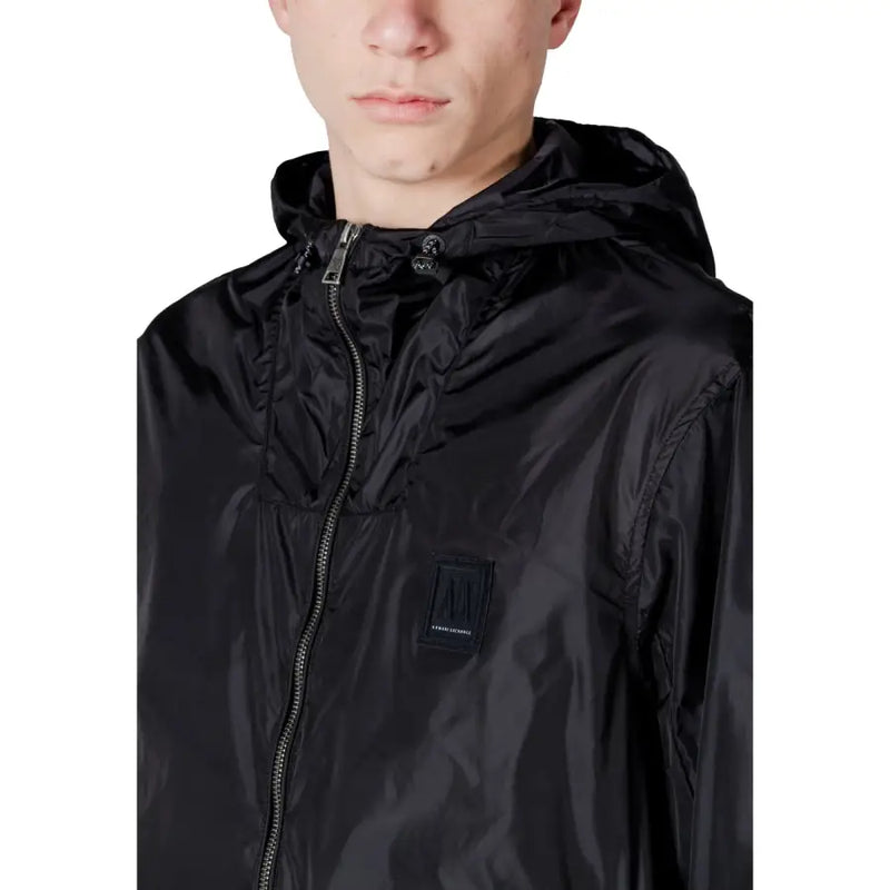 Black glossy nylon hooded long blazer with front zipper and pockets featuring small armani exchange brand patch