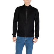 Black zip-up jacket with ribbed cuffs and hem, likely made of polyester or cotton blend.