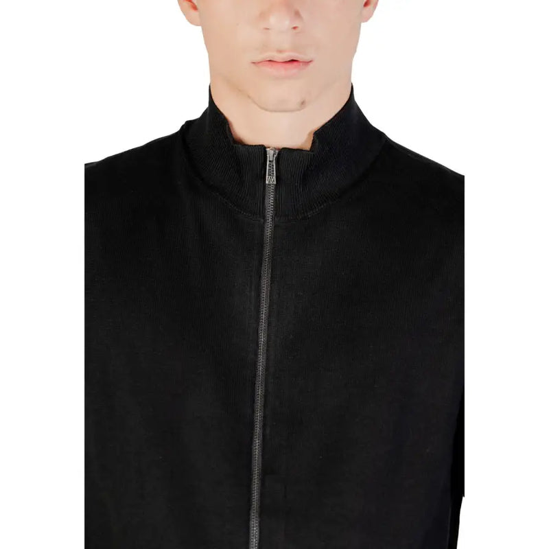 Black ribbed knit zip-up jacket with high collar and silver zipper from Armani Exchange knitwear collection