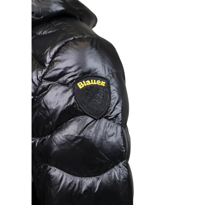 Blauer puffer jacket for men in black with shiny quilted texture and shield-shaped embroidered patch front view