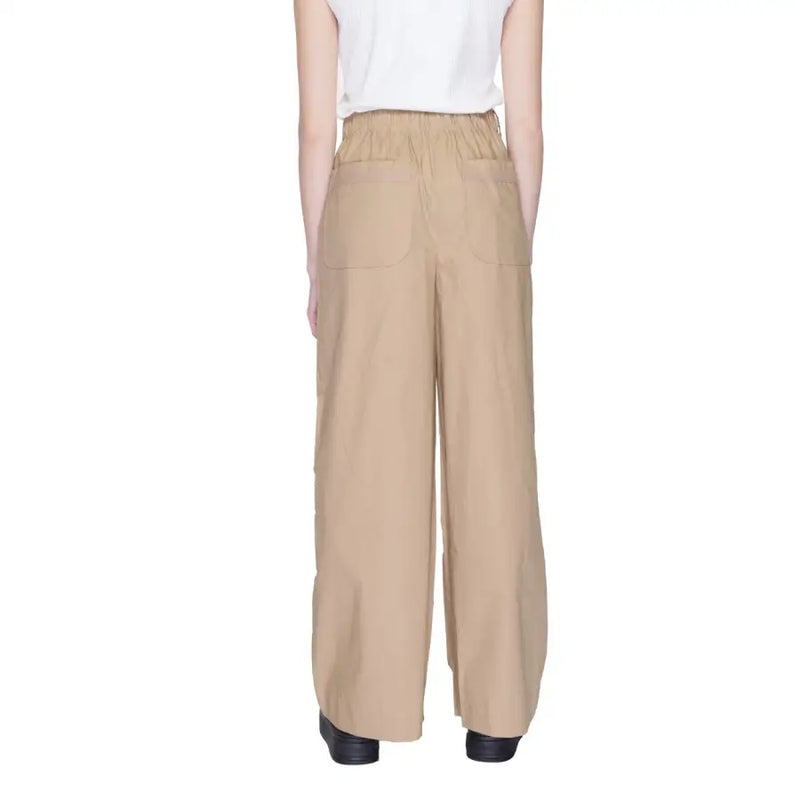 Blauer women’s beige cotton wide-leg trousers shown from the back with elastic waistband and two back pockets