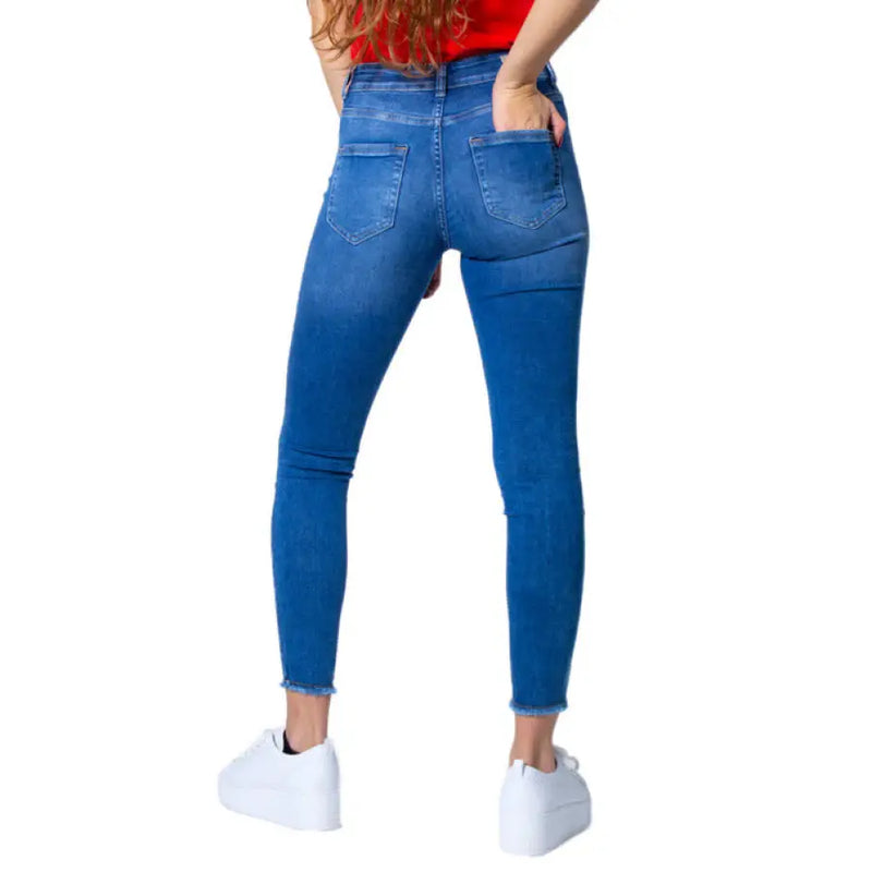 Blue Denim Skinny Jeans displayed in a product image