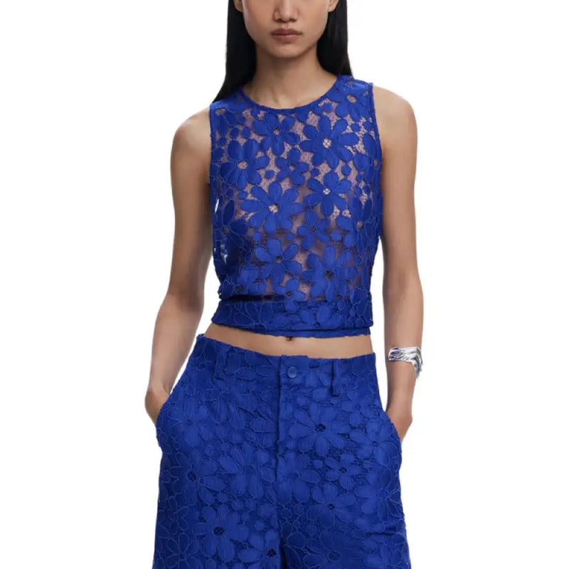 Blue floral lace top and pants set displayed for elegant fashion style