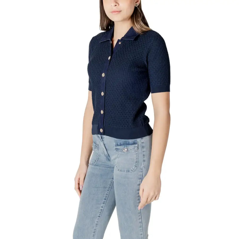 Navy blue ribbed knit short sleeve button-up top with automatic buttons by Morgan De Toi front view