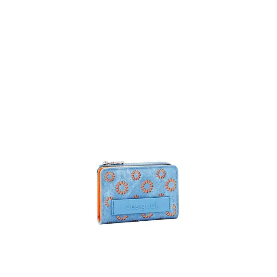 Blue Desigual women’s wallet with orange flowers showcasing urban city style