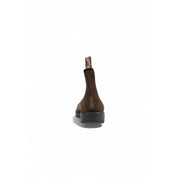Brown suede Blundstone men leather Chelsea boot with black rubber sole and pull tab at the back showing rear view