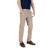 Men’s khaki cotton elastane trousers with brown boat shoes for spring summer style