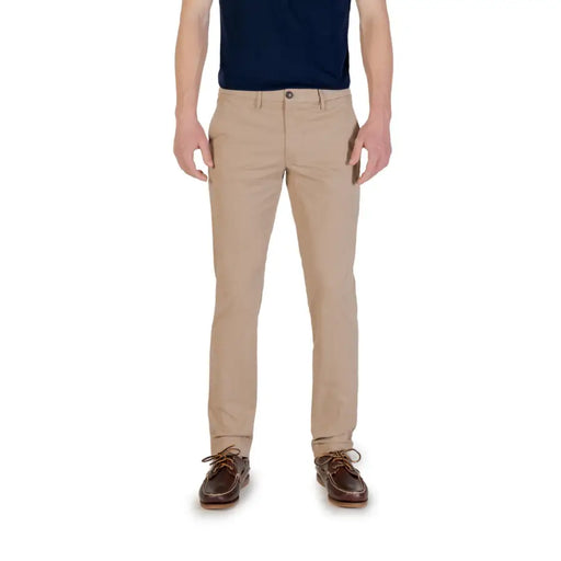 Men’s dark blue polo shirt with khaki chino pants, showcasing Borghese Mens Beige Cotton Stretch Trousers