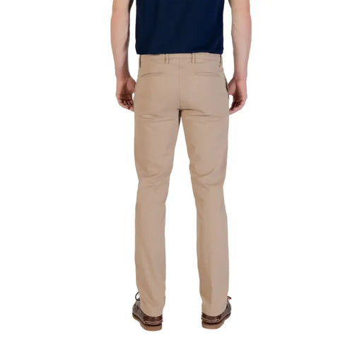 Men’s tan chino pants paired with a navy shirt from Borghese Mens Beige Cotton Stretch Trousers