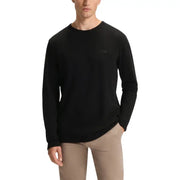 Black crew neck sweater with ribbed cuffs and hem, made of cotton.